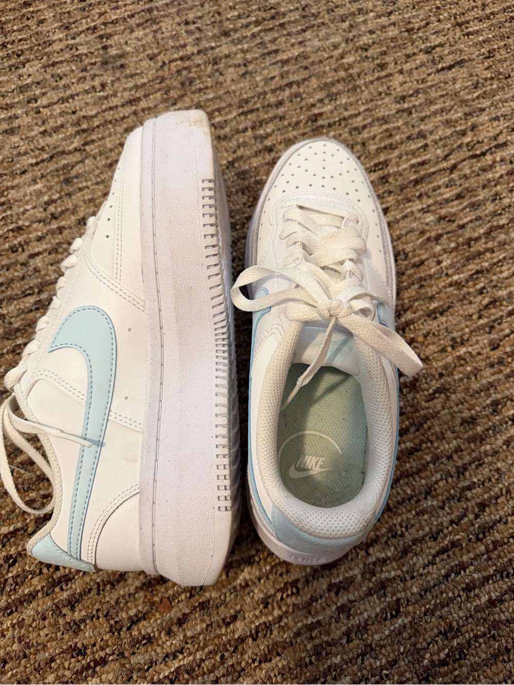 Nike Woman’s White Sneakers with Light Blue Swoosh